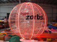 लाल शिनिंग 1.0MM पीवीसी / TPU Inflatable बुलबुला गेंद एलईडी लाइट एन लोगो के साथ
