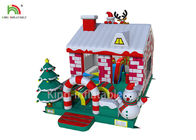व्यापार के लिए क्रिसमस ट्री के साथ लाल / सफेद रंग की ज्वलनशील उछालभरी कैसल हाउस