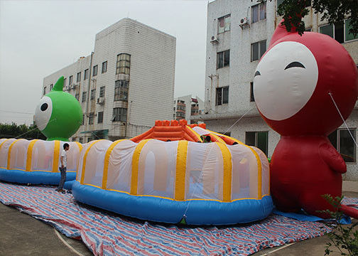 बाधा कोर्स के साथ 0.55 मिमी आउटडोर विशाल Inflatable डबल लेन स्लाइड