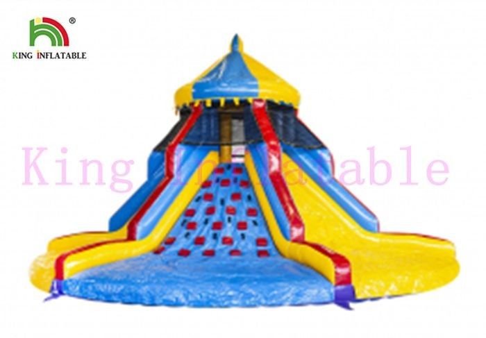PVC Colorful Blow Up Carousel Dry Slide Tower Slide With Climbing Wall For Kids